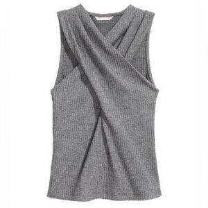 This is a H&M grey ribbed sleeveless top crosses in front